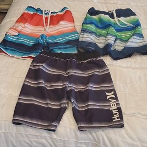 Boys swim trunks, 1 Hurley, other 2 are Kanu Surf